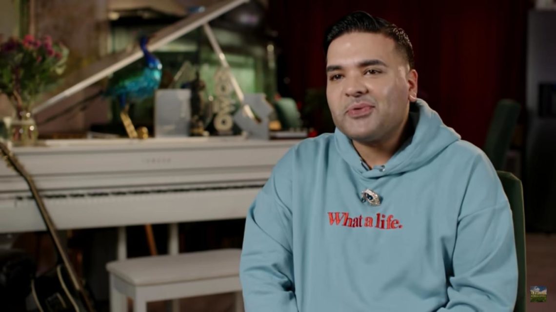 Who are Naughty Boy's parents and what is his ethnicity?