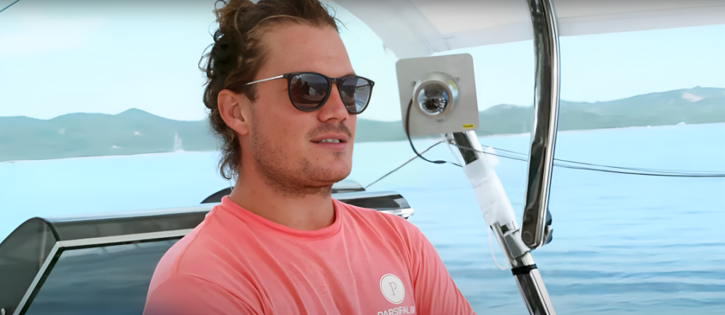 Gary King standing on a yacht with sunglasses on in Below Deck Sailing Yacht