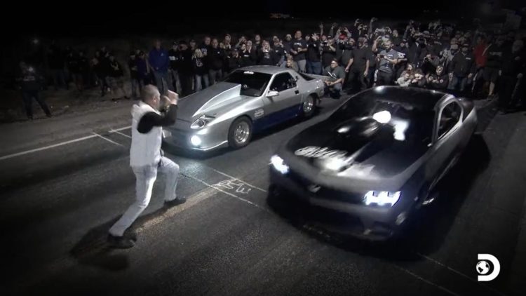 Where is Street Outlaws filmed as the car racers Prep their engines?