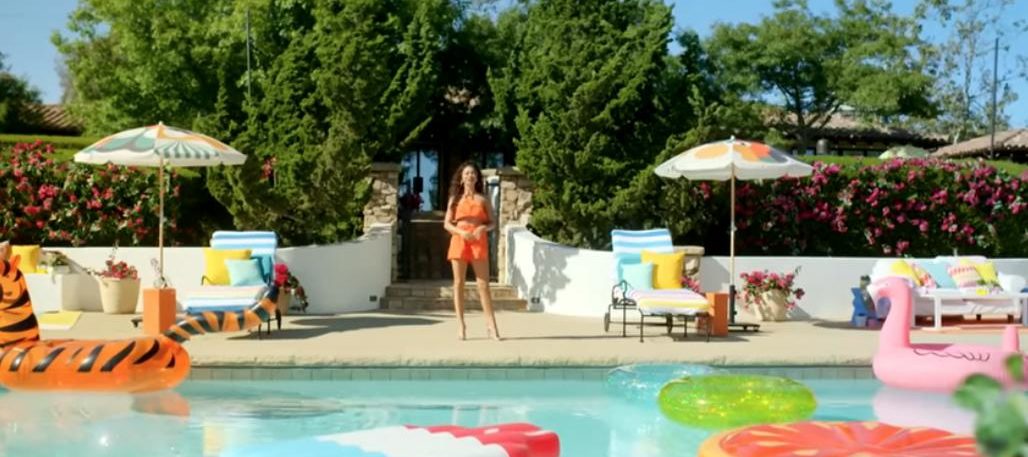 Love Island USA host stands poolside to present the show
