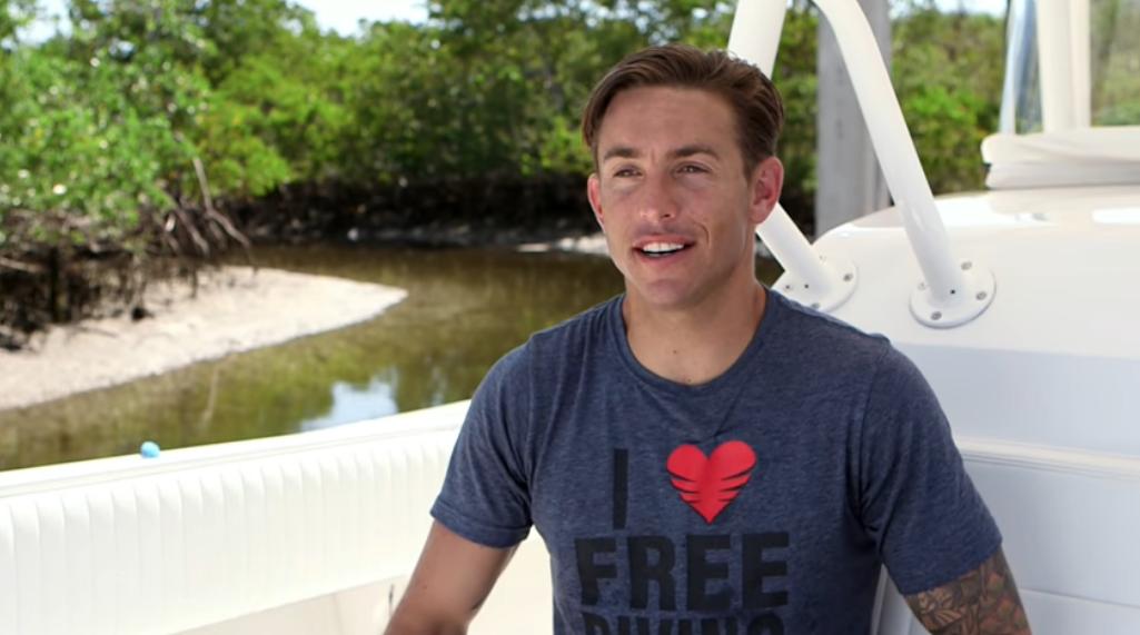 Michael Dornellas sat down for an interview about sharks wearing an 'I heart freediviing' t-shirt