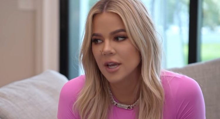 Khloé Kardashian steals the spotlight from her sisters with tight pink pantsuit