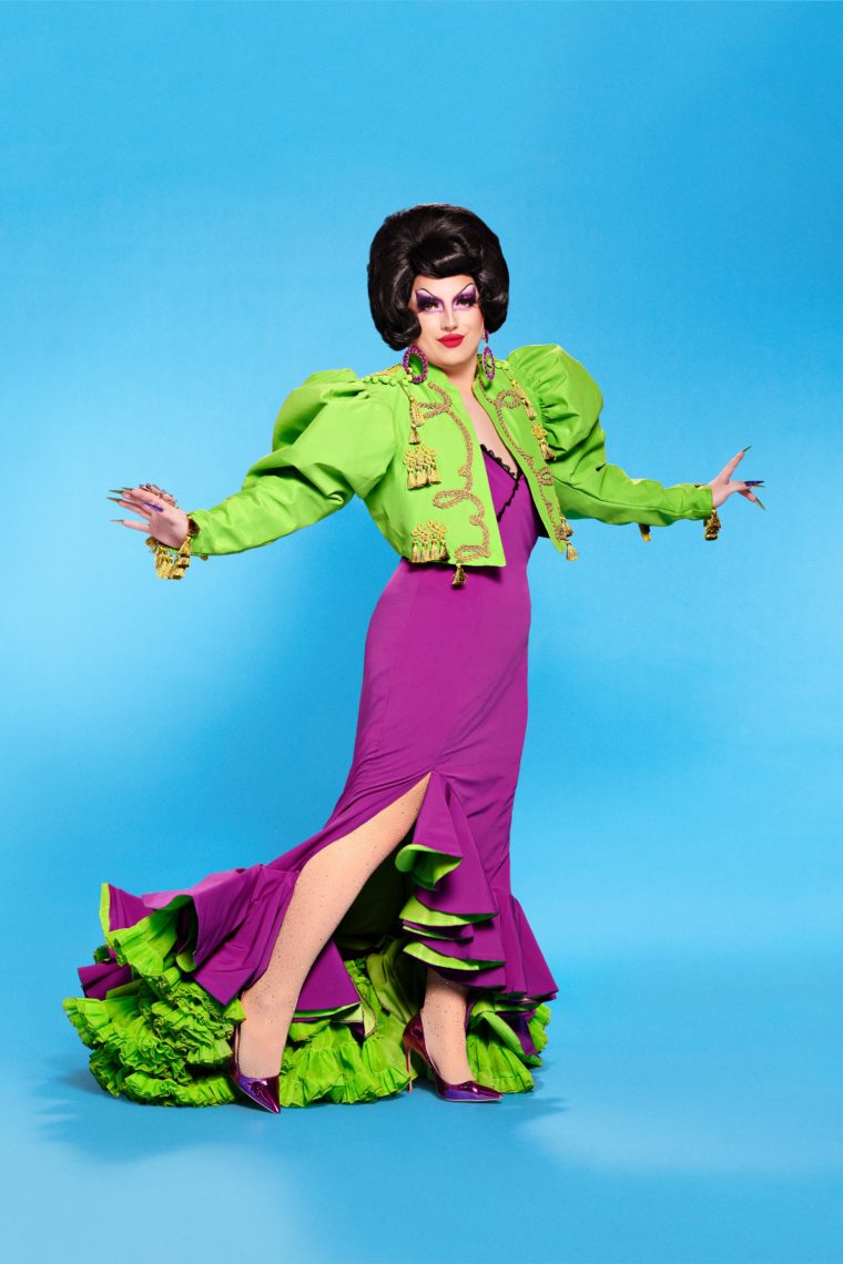 Choriza May rocks a green and purple custom look for the promo of RuPaul's Drag Race UK S3