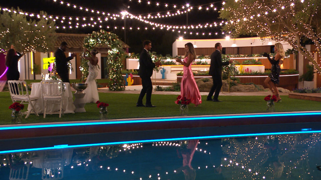 The four couples dance on the green in the Love Island villa for the finale episode