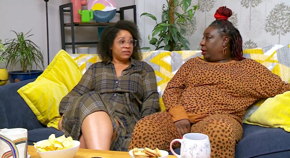 Danielle and Daniella from Gogglebox look at each other on sofa.