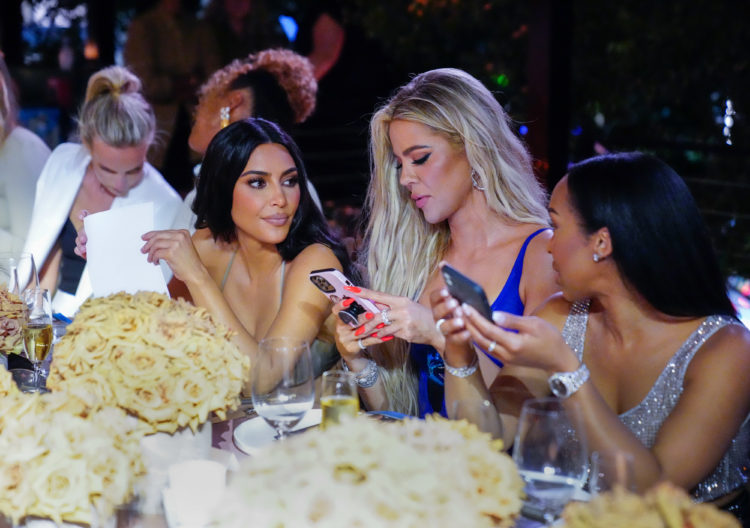 Khloe Kardashian jokes that Kim is 'feeling wealthy' as she reps full Balenciaga