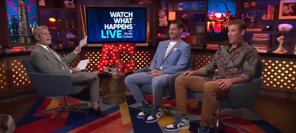 Craig Conover and Austen Kroll sit on the sofa on WWHL with Andy Cohen