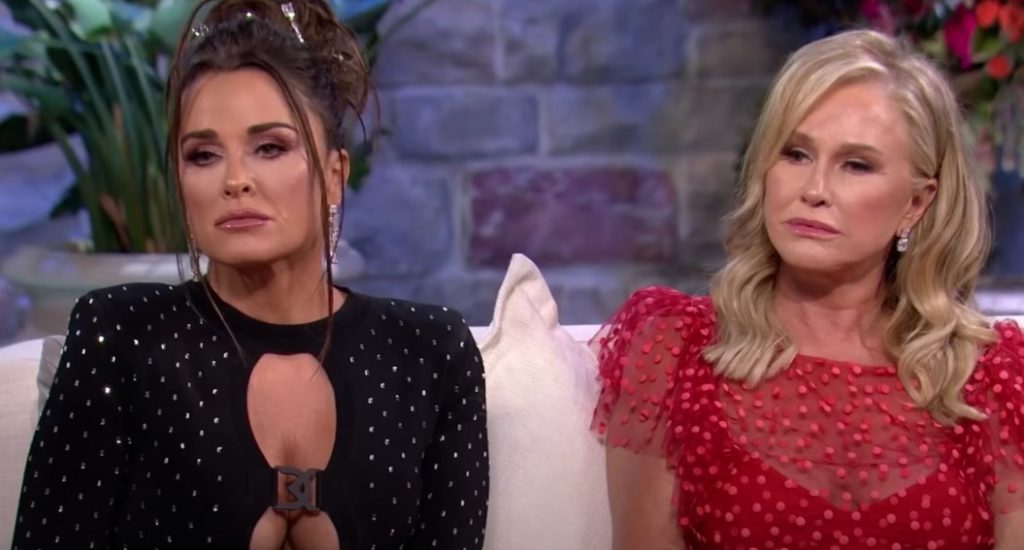 Kyle Richards sits next to Kathy Hilton on the couch