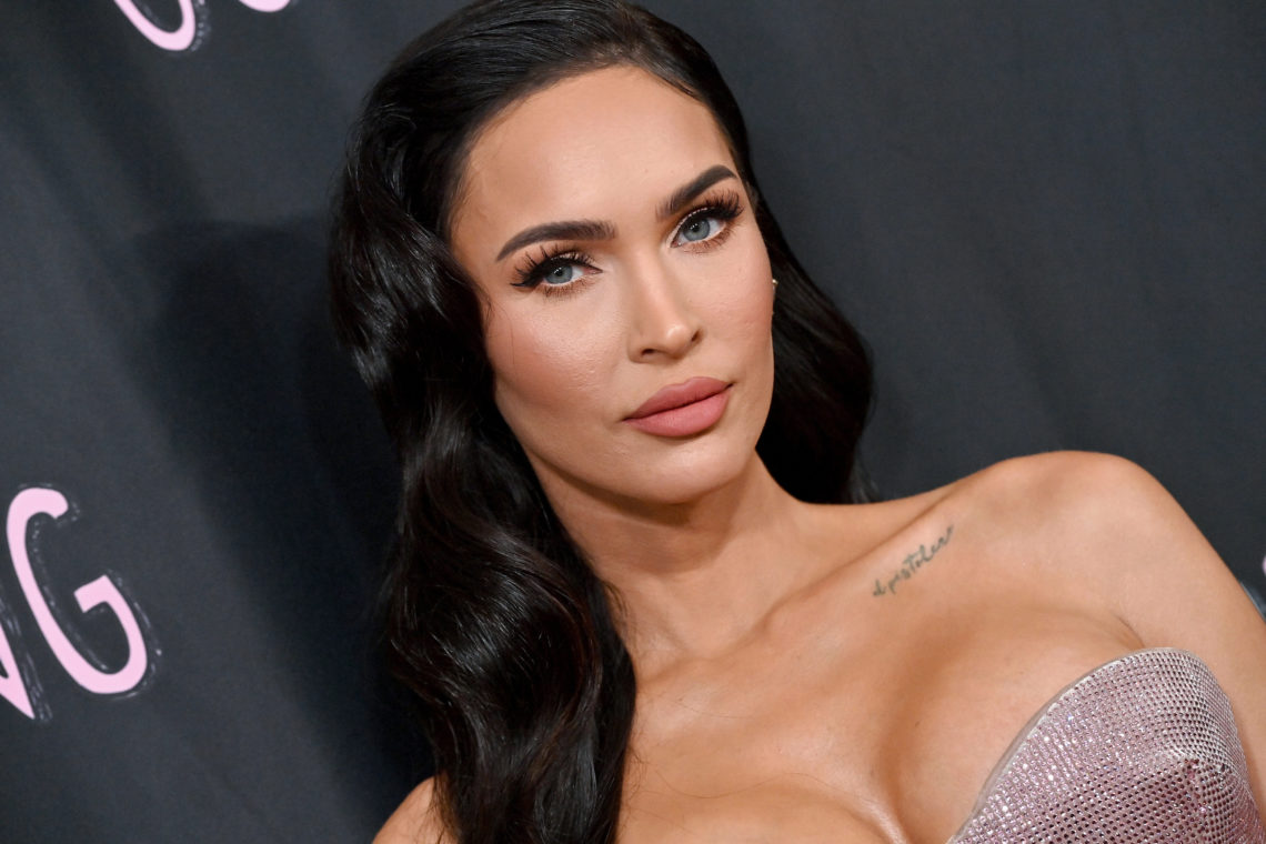 Harry Potter stan Megan Fox channels her inner lioness with daring fishnet dress