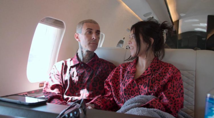 Kourtney Kardashian grips Travis' hand to recite sweet prayer before plane ride