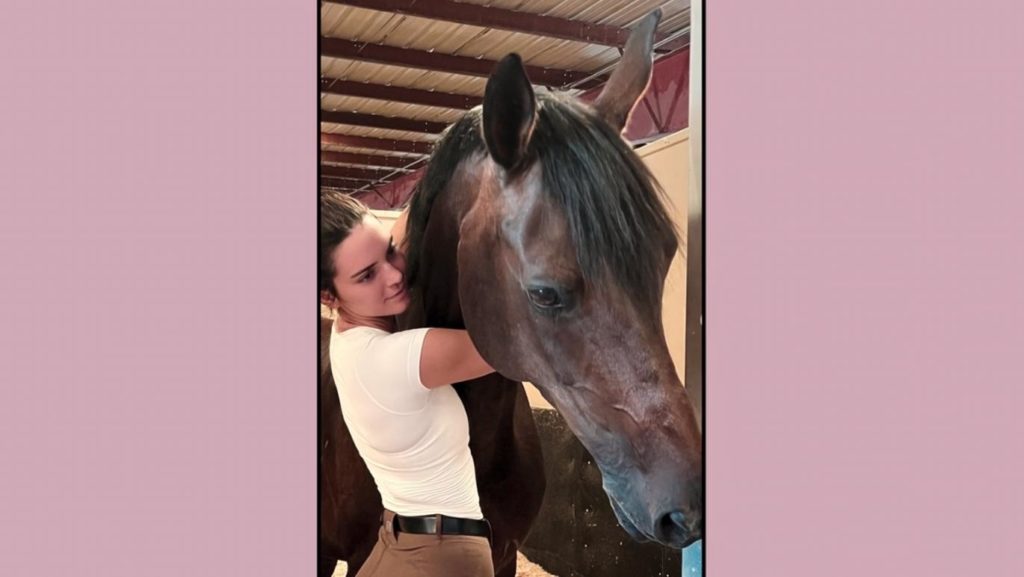 Kendall Jenner hugs her horse in a photo shared on The Kardashians