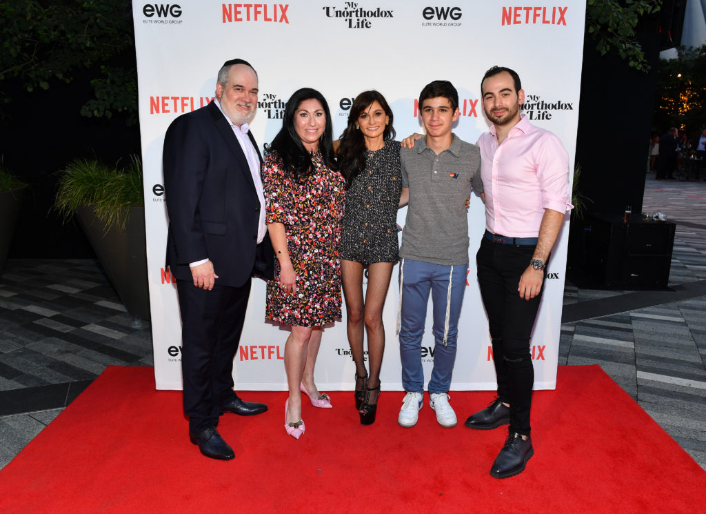 Yosef Hendler, Aliza Schulhof Hendler, Julia Haart, Aron Hendler and Shlomo Haart pose for group photo at launch of Netflix's My Unorthodox Life