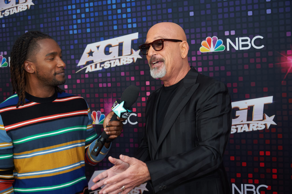 Howie Mandel speaks to reporter on "America's Got Talent: All-Stars" Red Carpet