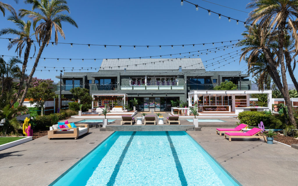 A picture of Winter Love Island villa, showing the full house and outdoor swimming pool