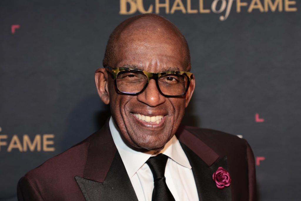 Al Roker smiles at camera wearing glasses and dark red suit at 2022 Broadcasting & Cable Hall Of Fame