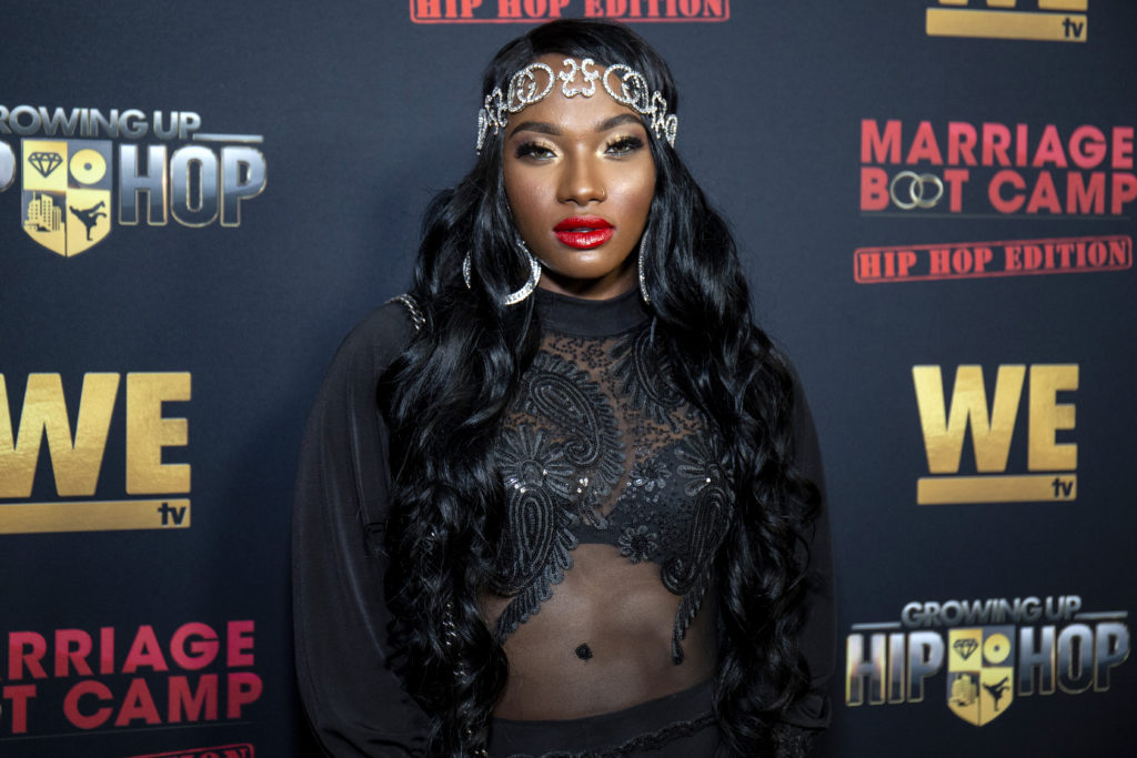 Egypt Criss at Growing Up Hip Hop 2019 premier wearing sheer b;ack top and silver head piece looking into camera
