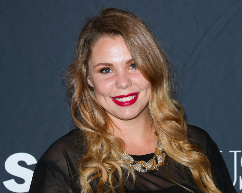 Teen Mom 2's Kailyn Lowry at Star Magazine party wearing black sheer dress and red lipstick, smiling at camera