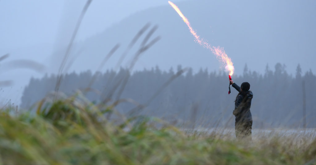 landscape shot of a contestant firing a flare