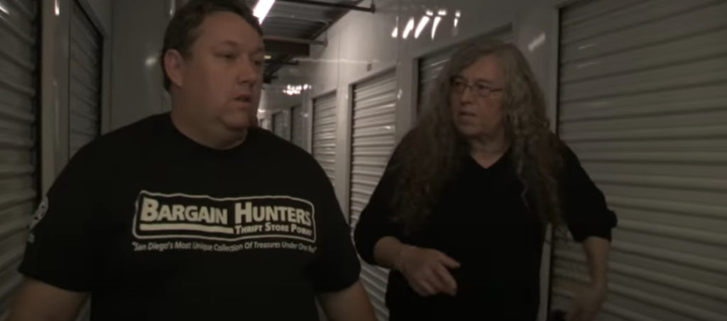 Gunter and Rene Nezhoda walk through hallway on Storage Wars
