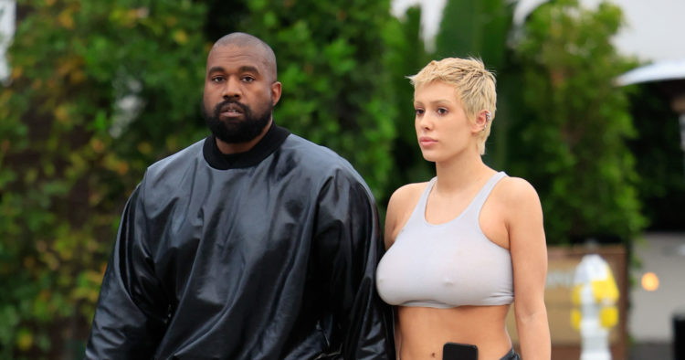 Kanye West 'looks like Darth Vader' as he steps out with girlfriend 18 years younger