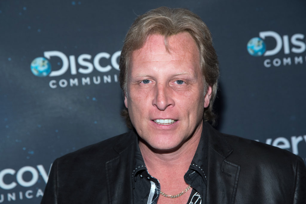 Sig Hansen attends Discovery 30th Anniversary Celebration wearing black jacket 