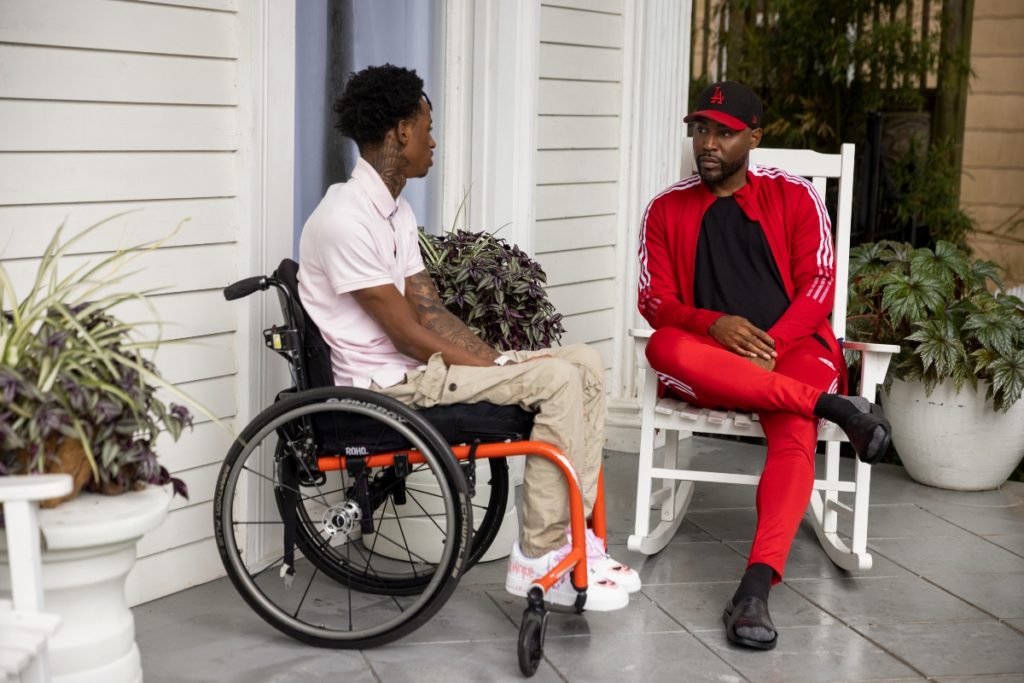 Ray Walker AKA Speedy speaks to Karamo Brown on porch on Queer Eye season 7