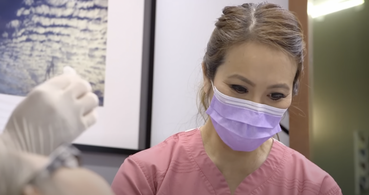 Dr Pimple Popper squeezes 68 lipomas out of a patient's arms in one sitting