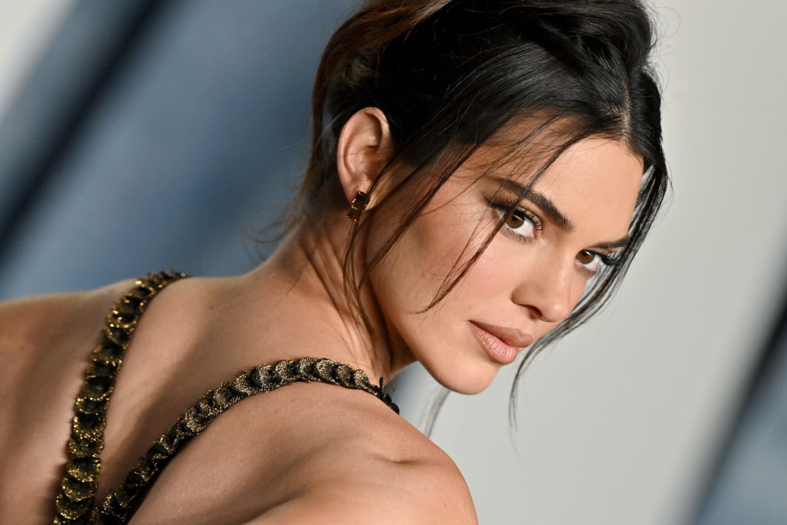 Kendall Jenner risks wardrobe malfunction with perfectly placed petals on sheer dress