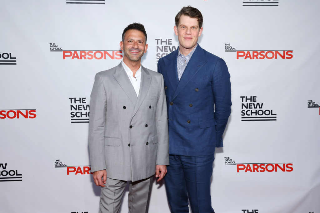 Paul Arnhold and Wes Gordon stand together in suits at 74th Annual Parsons Benefit