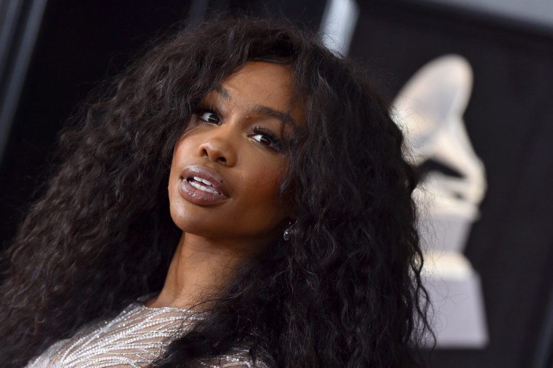 SZA was sensitive 'bout having no booty before going under the knife