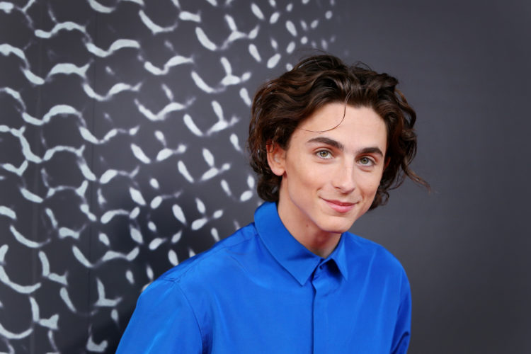 Timothée Chalamet fans mock his age after he's seen smoking next to Kylie Jenner