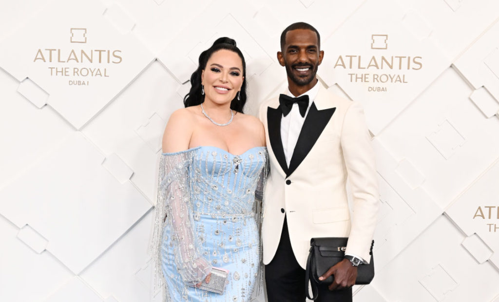 Mona Kattan and Hassan Elamin smile at the Atlantis The Royal Grand Reveal Weekend 2023 - Red Carpet Arrivals